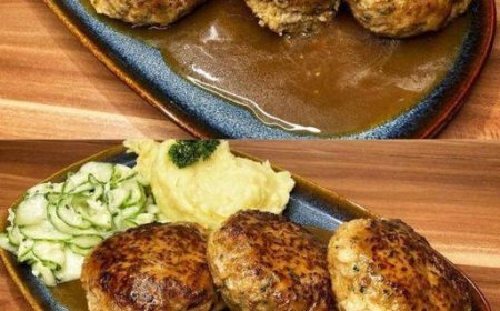 Fleischpflanzerl mit Kartoffelpüree und Gurkensalat