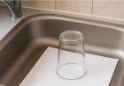 Here’s why you should always leave an upturned glass and a piece of paper in the sink before going on vacation